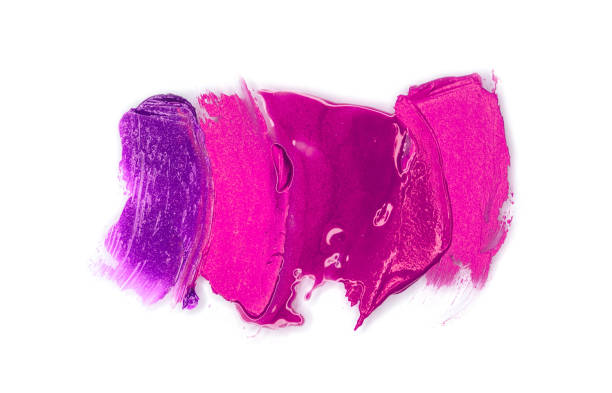istock Pink lipstick smudges isolated on white background. Top view, flat lay. 1221977617