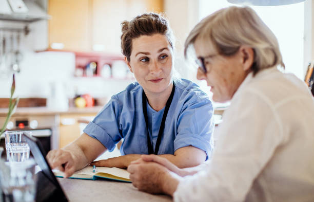 istock District nurse at home visit 1221980634