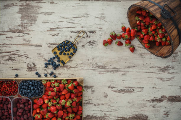 istock Baskets filled with ripe fresh berries 1221981435