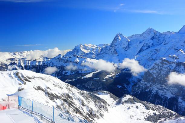 view of eiger and mönch from schilthorn. bernese alps of switzerland, europe. - monch sun snow european alps imagens e fotografias de stock