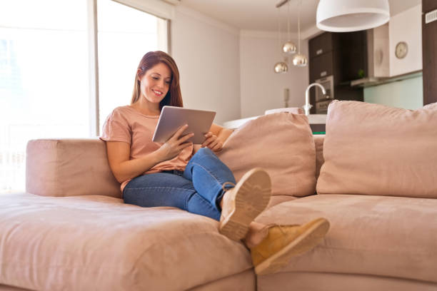 istock Woman using digital tablet during lockdown due to COVID-19 1221982670