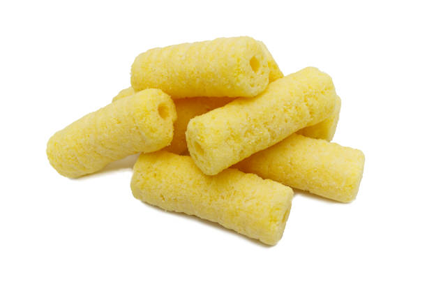 istock Handful of sweet crunchy corn sticks, snacks isolated on white background. 1221982831