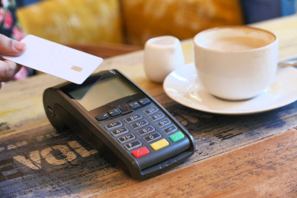 istock Payment terminal charging from a credit card , close up 1221984465