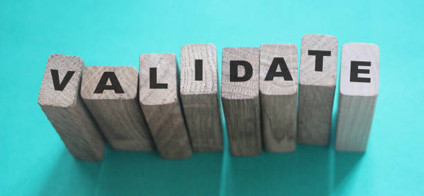 istock Validate word on Wooden Blocks. Business evaluation concept 1221984550
