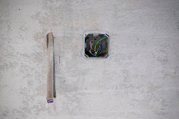 istock Electricity Installation in Modern Apartment Under Construction 1221984839