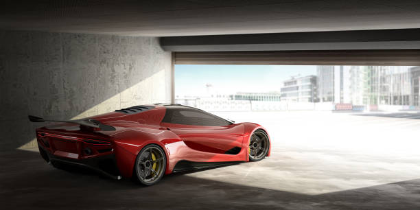 coche deportivo rojo en garaje de puertas abiertas en un día brillante - coche deportivo fotos fotografías e imágenes de stock
