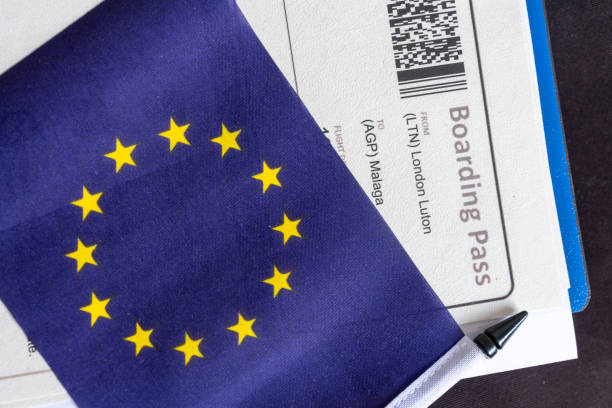 istock Euro flag and airplane ticket 1221990717