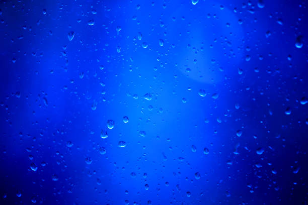 istock Drops of rain on a glass 1221994152