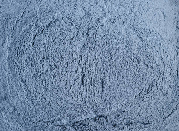 istock Light blue bentonite facial clay powder (alginate mask, face cream, body wrap) texture close up, selective focus. Abstract background with brush strokes. 1221994222