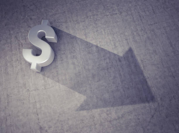 istock Foreshadowing: Falling Value of the Dollar Currency, losing Money 1221995819