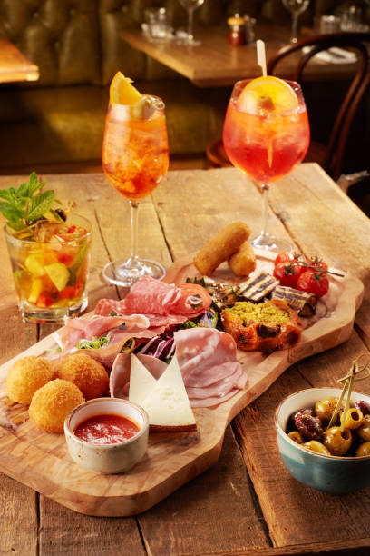 An Italian aperitif Typical Italian charcuterie board,Italian aperitif photos stock pictures, royalty-free photos & images