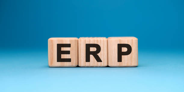 istock ERP crm concept on wooden cubes on a blue gradient background 1221997061