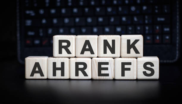 Rank ahrefs - text on wooden cubes on the background with keyboard