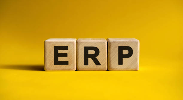 istock ERP text on wooden cubes on a yellow background 1221997088