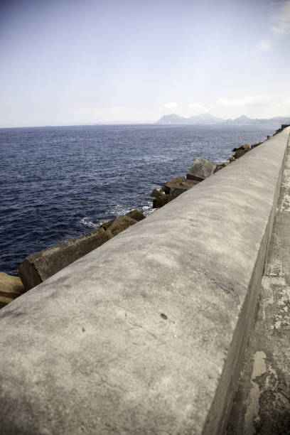 istock Stone dam in the sea 1222005480