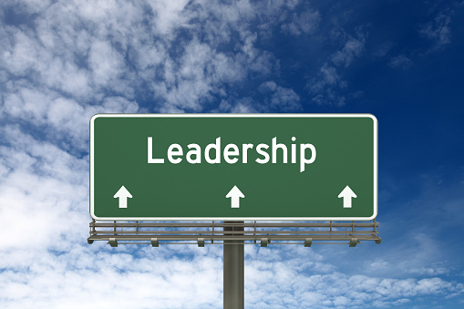 Leadership success motivation highway sign