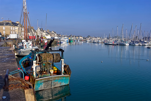 Fishing boat in the port of Saint-Vaast-la-Hougue, a commune in the peninsula of Cotentin in the Manche department in Lower Normandy in \n\tnorth-western France