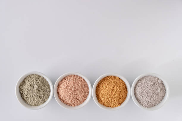 istock Set of different cosmetic clay mud powders on white background 1222013455