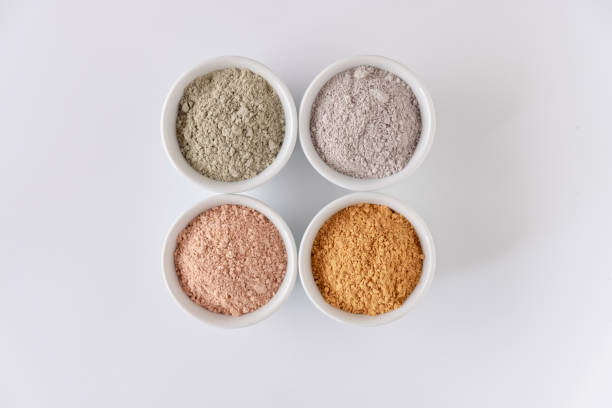 istock Set of different cosmetic clay mud powders on white background 1222013701