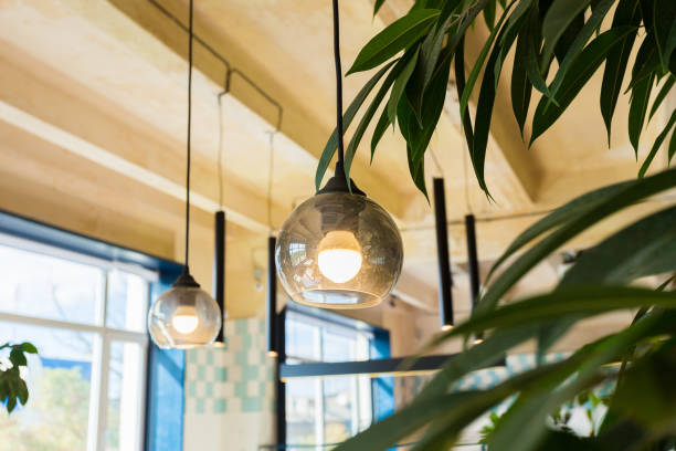 istock modern glass and metal loft lamps in a design office 1222014976