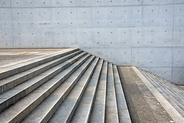 istock Isolated granite stairs and a concrete wall 122201619