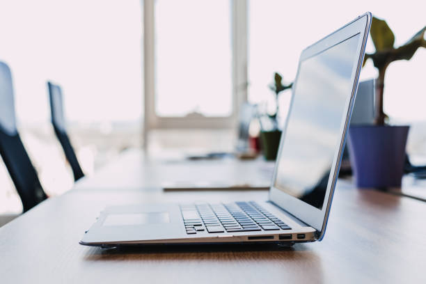 istock modern laptop on the desktop with office supplies. new workplace concept 1222016654