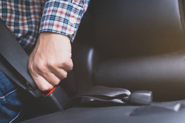 istock close up hand and safety belt 1222018894
