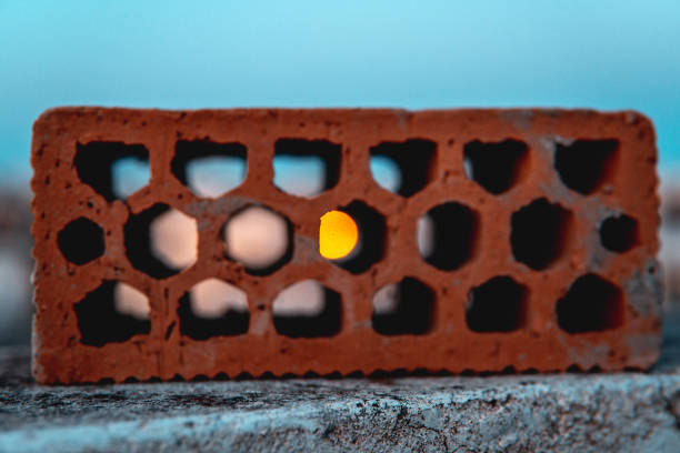 Ordinary brick against the sky, at sunset