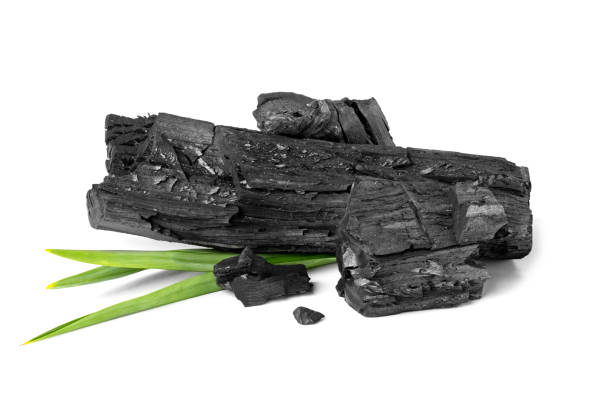 istock wood natural charcoal with pandan leaf isolate on white background 1222024585
