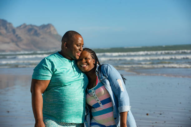 istock Happy beach walk couple on honeymoon 1222024735