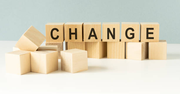 istock Hand hold flip wooden cube with word change 1222026443
