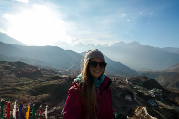 istock Muktinath - A woman enjoying the Himalayan landscape 1222027439
