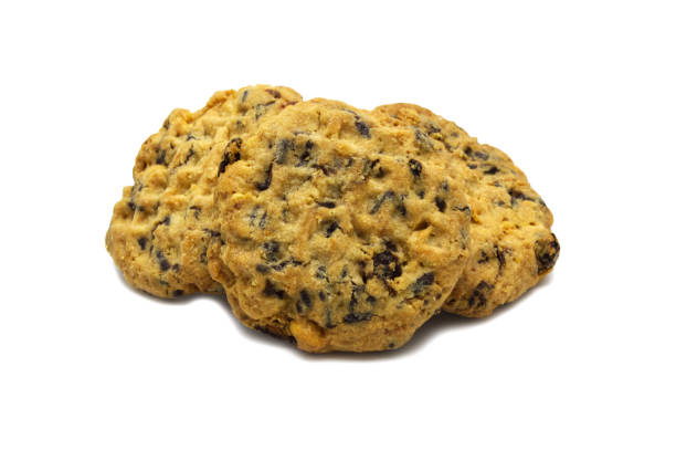 Homemade Oatmeal Raisin Cookies isolated on a white background.
