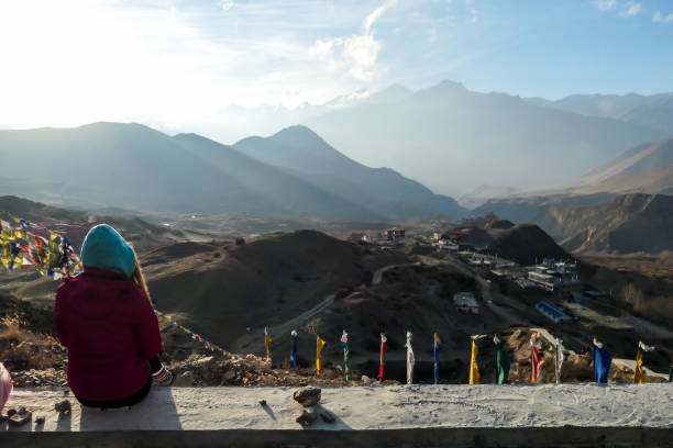 istock Muktinath - A woman observing the Himalayas 1222028462