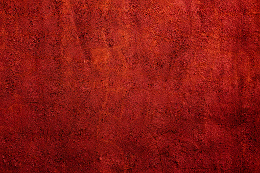 Red colored wall texture background with textures of different red shades