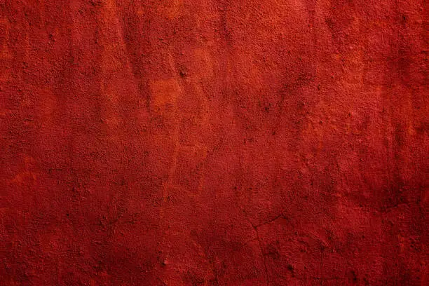 Photo of Red colored wall texture background with textures of different shades of red