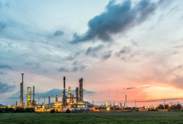 Oil refinery at sunrise stock photo