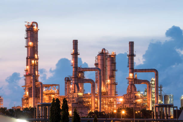 istock oil refinery industry with sunrise 1222029064