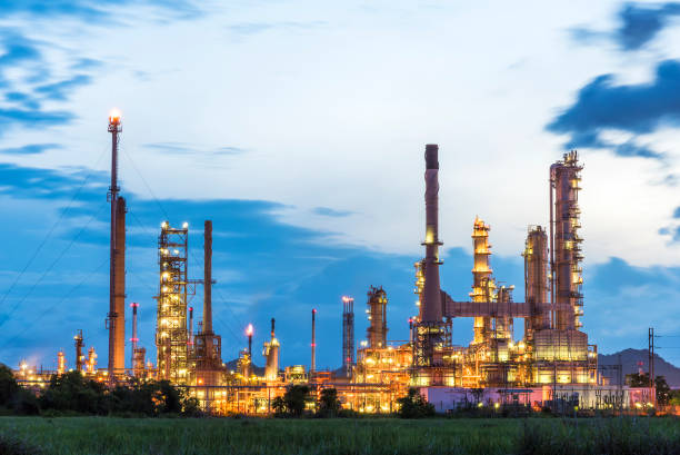 istock Oil refinery plant at twilight sky 1222029194