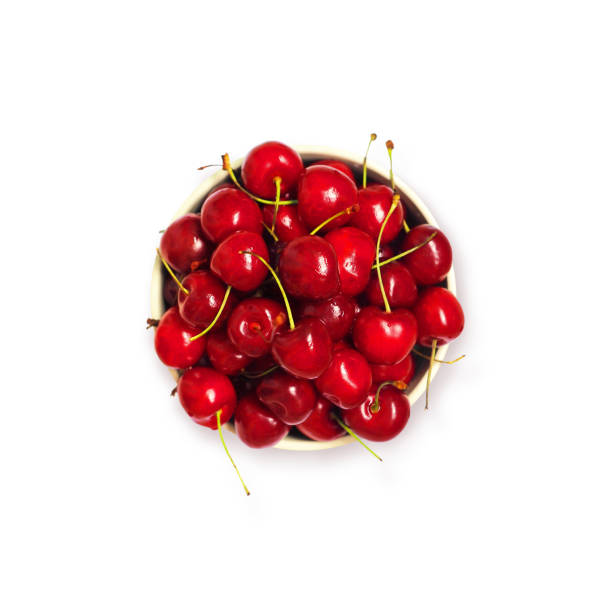 istock Red cherry in plate isolated on a white background, top view. Prunus avium 1222029460