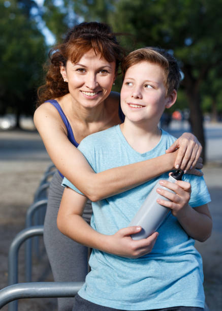 istock Family during break in outdoors workout 1222029733