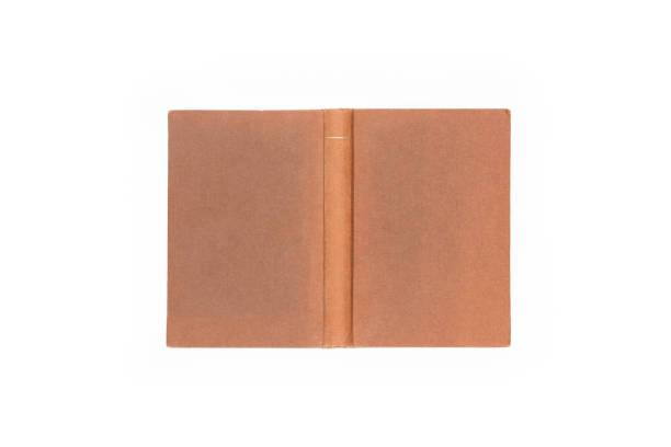 istock Open hard cover terracotta book on white background 1222029752