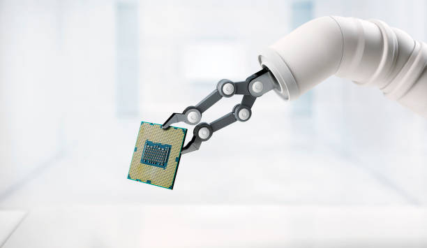 Modern white robot arm holding computer processor with copy space.