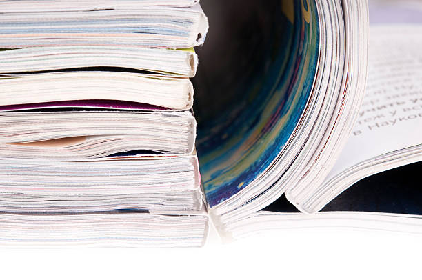 istock pile of magazines with bending pages 122203199