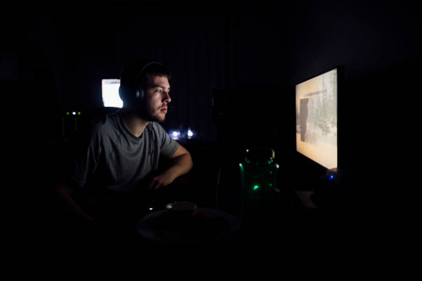 istock Male Gaming at Night 1222034447