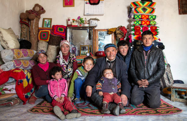 kazak family in rural Mongolia bayan Ulgii, Mongolia, 1st October 2015: mongolian nomad family in their home mongolian ethnicity stock pictures, royalty-free photos & images