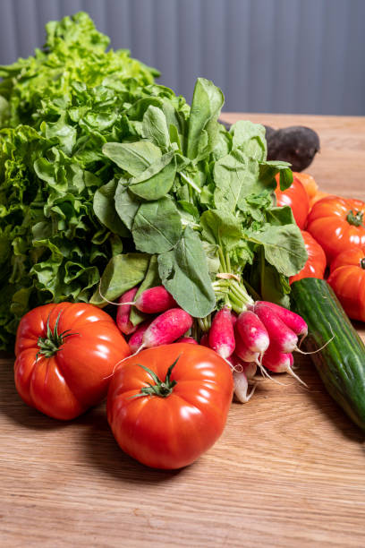 istock Varied organic vegetable harvest on a wooden kitchen table 1222036307