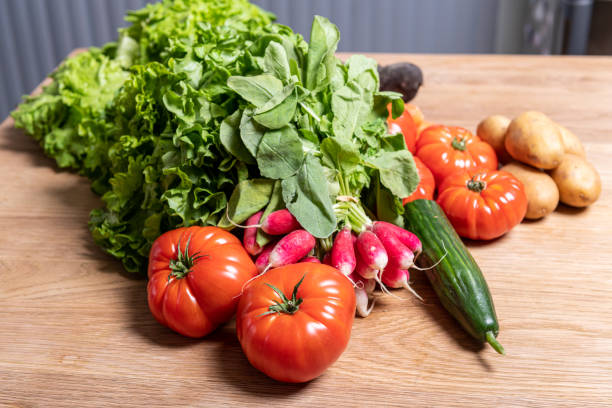 istock Varied organic vegetable harvest on a wooden kitchen table 1222036475
