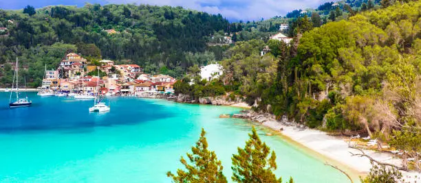 Photo of Greece, Ionian islands. Picturesque fishing village Lakka in Paxos with turquoise sea