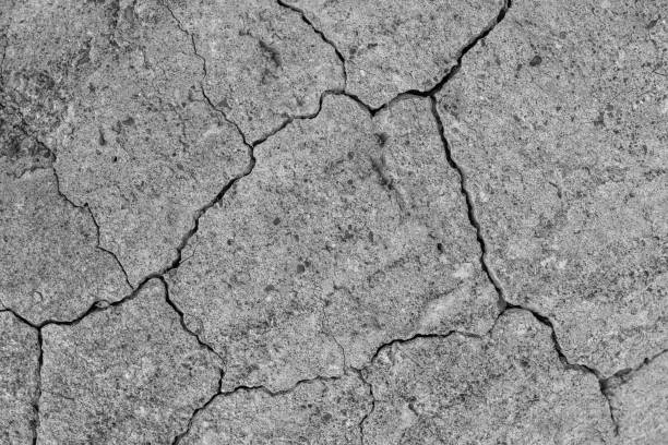 istock old concrete cement with cracks and natural destruction 1222042351